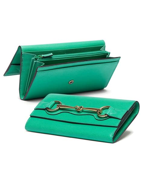 green Gucci wallet with zipper